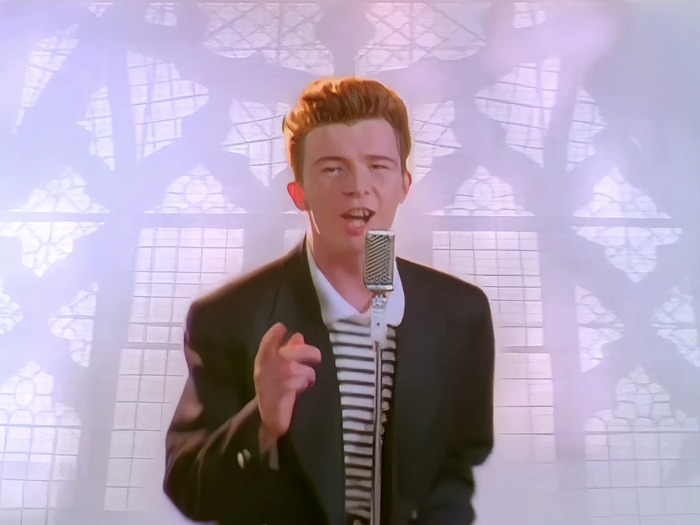 瑞克‧艾斯里（Rick Astley）的單曲〈Never Gonna Give You Up〉音樂錄影帶畫面。